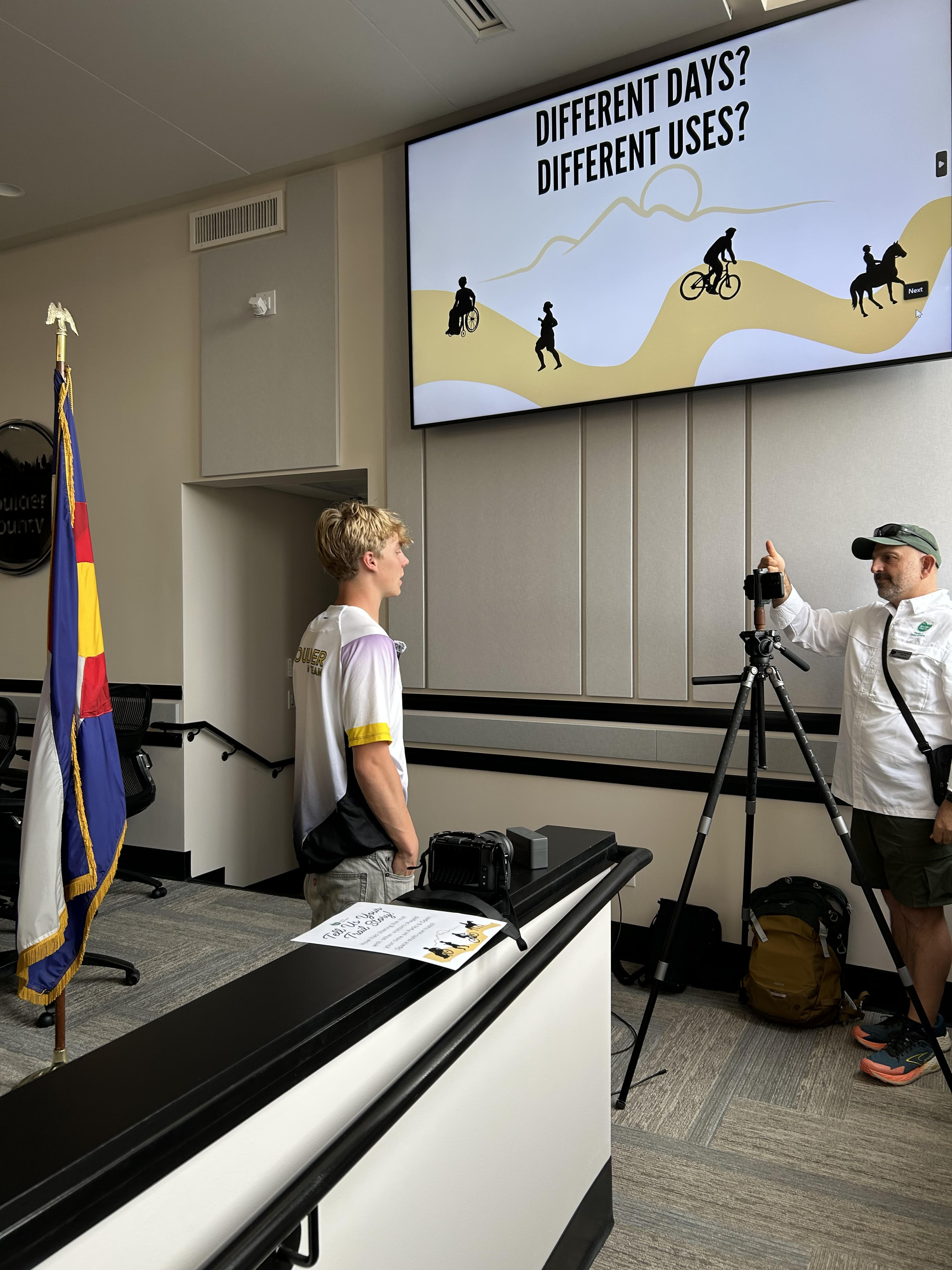 Rhys Jacobson, BHS MTB rider, giving testimony to a Boulder County videographer at the Open House